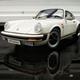 Illustration for article titled Carrera White Carrera 3.2 in the rain - Autoart 1:18